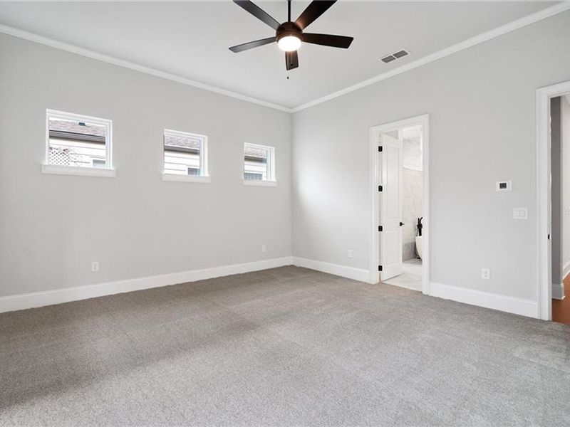 Spacious, unfurnished interior of a new home in The Village at Towne Lake, Woodstock (Image 62).
