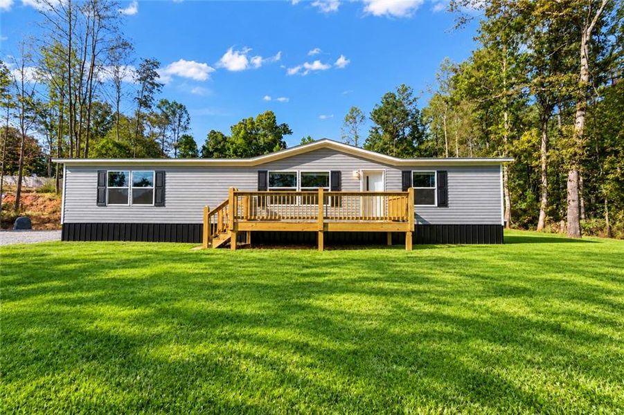 Exterior details and patio area of a home in , Ellijay (Image 26).