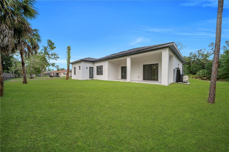 Exterior details and patio area of a home in , North Port (Image 22).