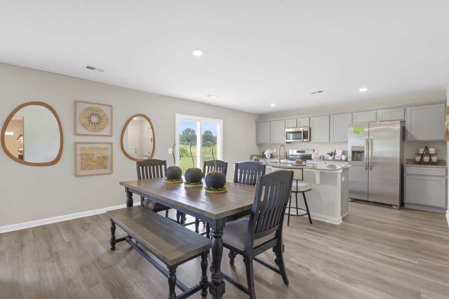 Representative furnished interior of a home built from the Myrtle A by McGuinn Homes in Crystal Downs, Sumter (Image 9).