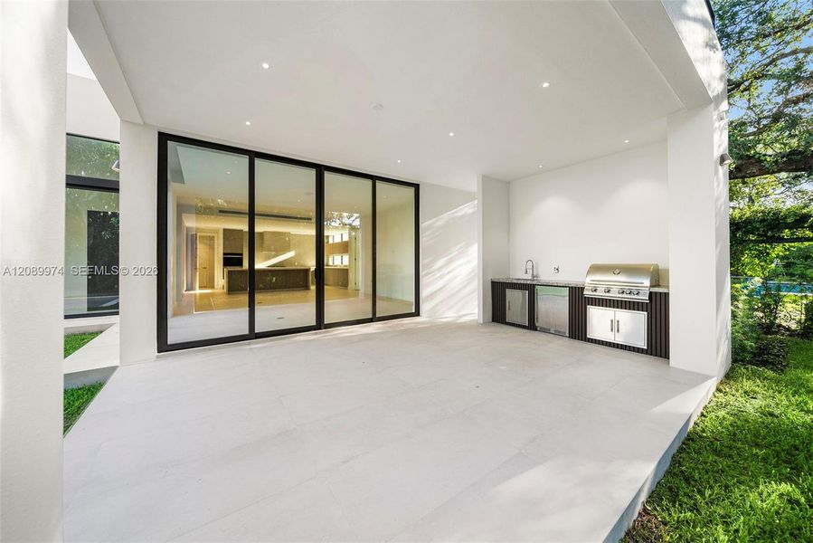Exterior details and patio area of a home in , South Miami (Image 38).