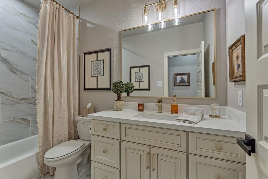 Another perfectly situated bathroom echoing the same craftmanship found throughout the home. Another perfectly situated bathroom echoing the same craftmanship found throughout the home.