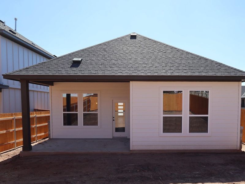 Exterior details and patio area of a home in Heritage, Dripping Springs (Image 19).
