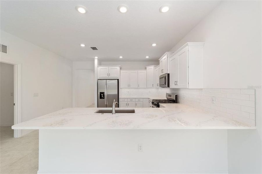 Furnished interior view inside a new home in Calesa Township, Ocala (Image 12).