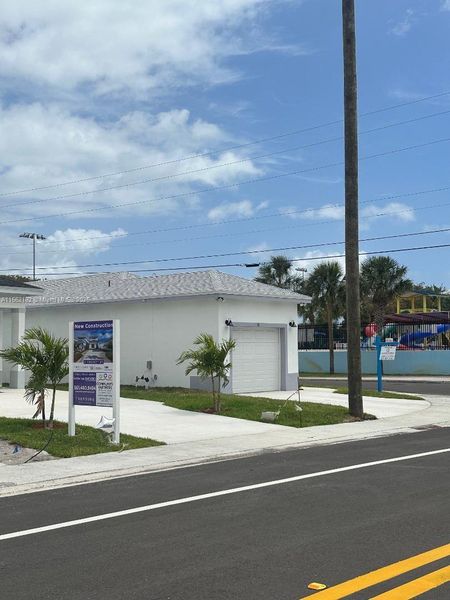 Front exterior of a new home in , Boynton Beach, FL, highlighting curb appeal (Image 19).