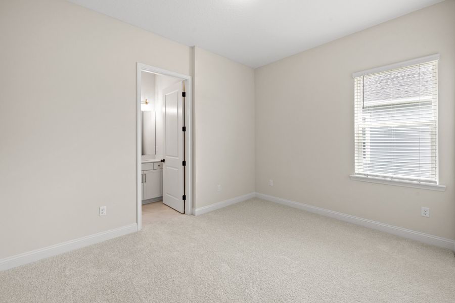 Representative unfurnished interior of a home built from the Aurora by Riverside Homes in Hidden Creek at SilverLeaf, St. Augustine (Image 39).