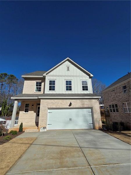 Front exterior of a new home in , Buford, GA, highlighting curb appeal (Image 2). Front exterior of a new home in , Buford, GA, highlighting curb appeal (Image 2).