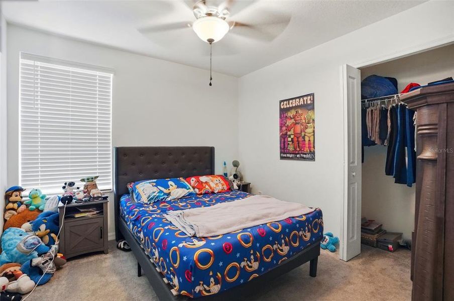 Furnished interior view inside a new home in The Isle of Avalon, Spring Hill (Image 18).