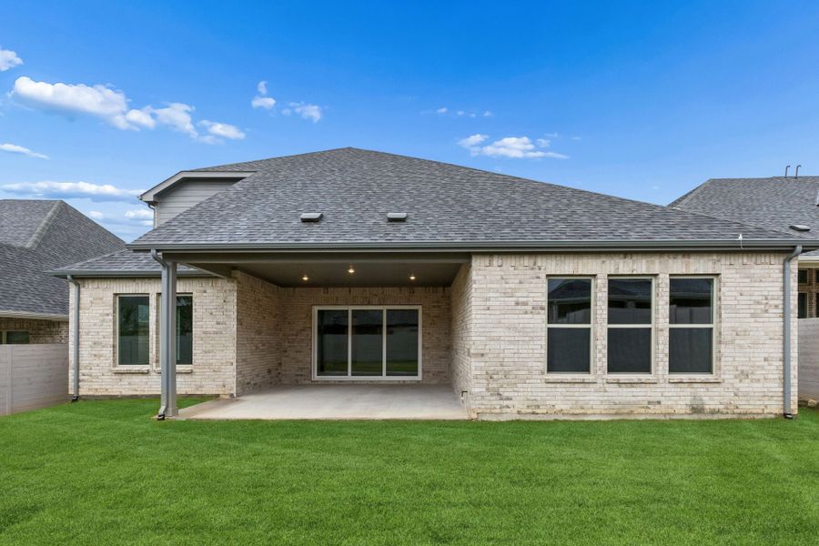 Exterior details and patio area of a home in Painted Tree Lakeside, McKinney (Image 3).