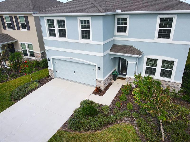 Front exterior of a new home in Solera at Lakewood Ranch, Lakewood Ranch, FL, highlighting curb appeal (Image 28).