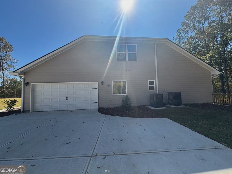 Exterior details and patio area of a home in Tuscany Hills, Douglasville (Image 3).