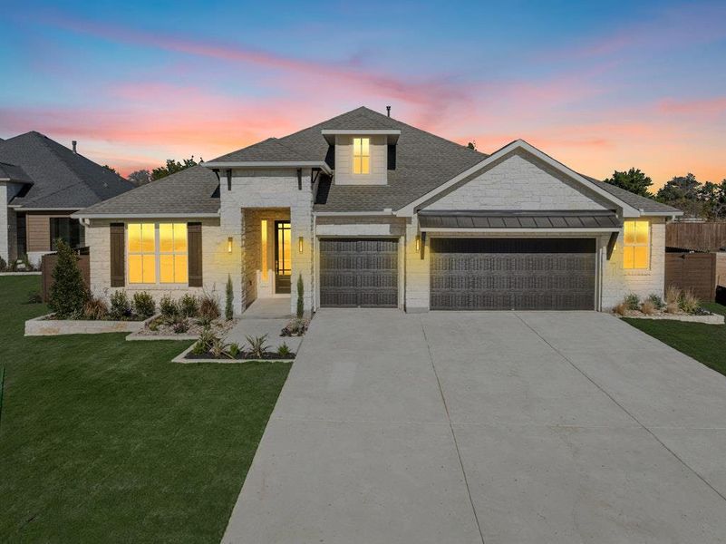 Front exterior of a new home in Riverstone, Georgetown, TX, highlighting curb appeal (Image 23). Front exterior of a new home in Riverstone, Georgetown, TX, highlighting curb appeal (Image 23).