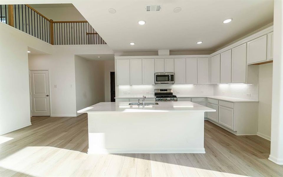 Furnished interior view inside a new home in La Terra, Celina (Image 7).