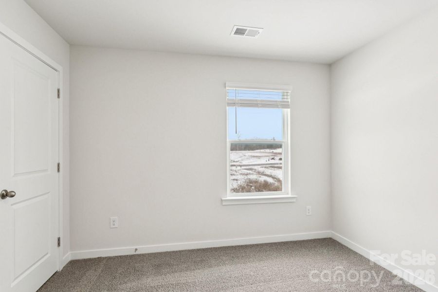Spacious, unfurnished interior of a new home in Zion Springs, Hickory (Image 24).