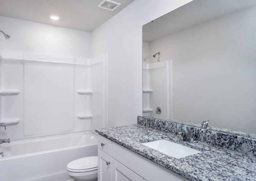 The bathrooms have granite countertops