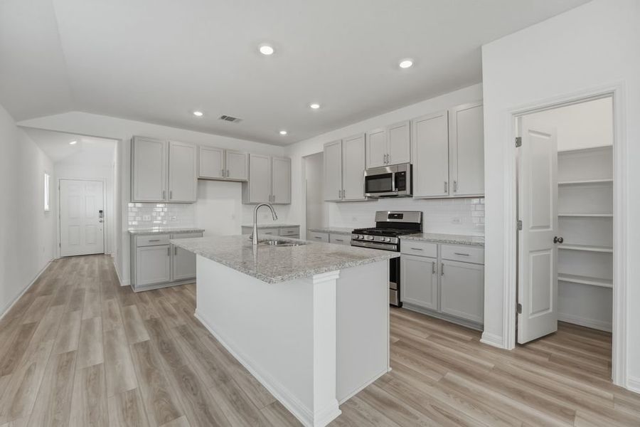 Furnished interior view inside a new home in Longview, Del Valle (Image 6).