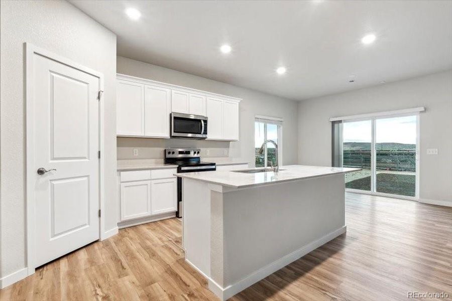 Furnished interior view inside a new home in Legato, Commerce City (Image 5).