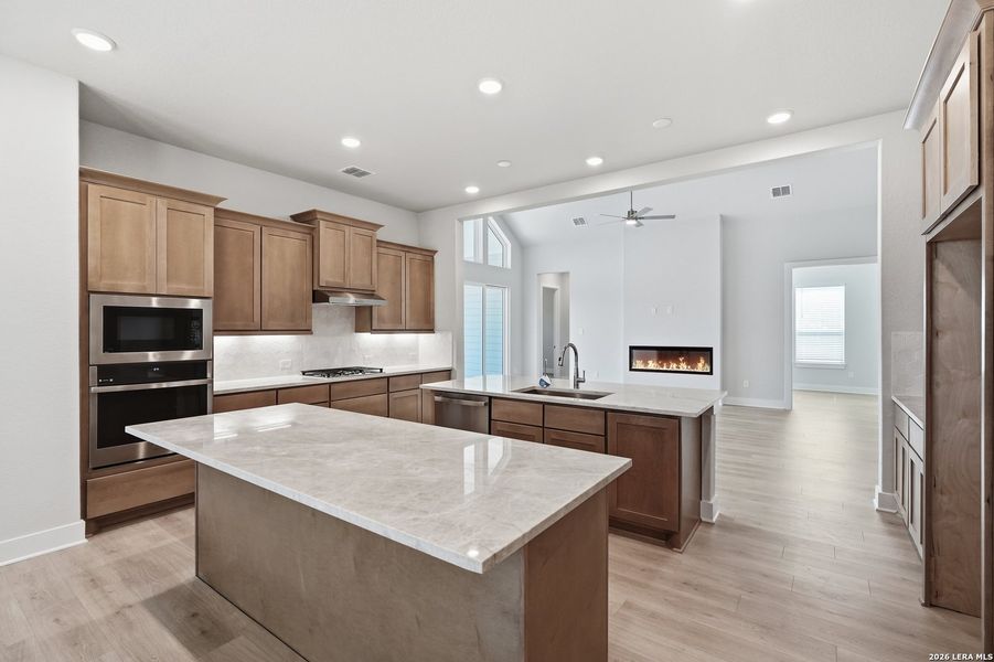 Furnished interior view inside a new home in Potranco Oaks, Castroville (Image 9).
