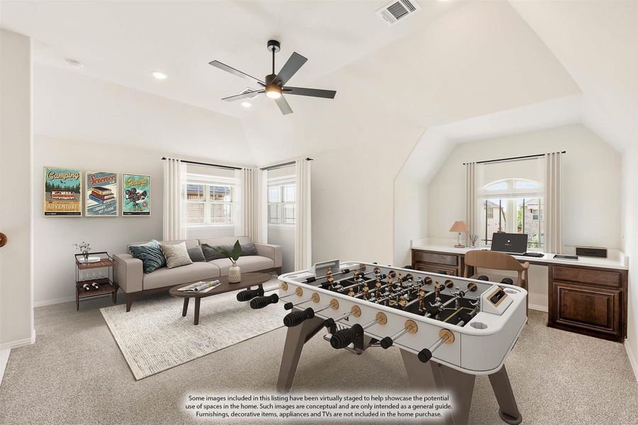 Bonus room with foosball table, sofa seating area, built-in desk, and ceiling fan on carpet flooring