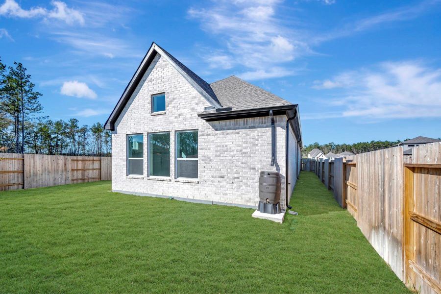 Exterior details and patio area of a home in ARTAVIA 45' Homesites, Conroe (Image 3).