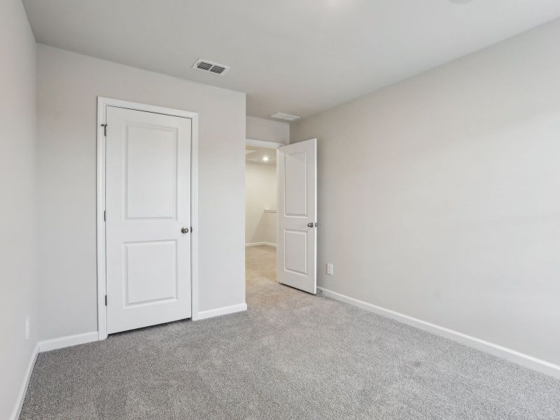 Spacious, unfurnished interior of a new home in Brooks Lake, Loganville (Image 17).