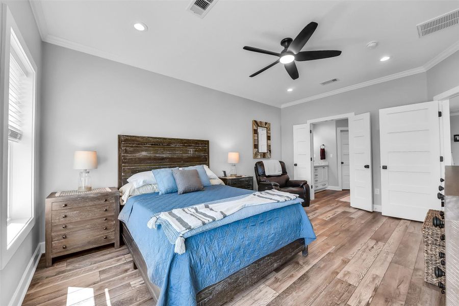 View of primary bedroom looking towards the primary bath