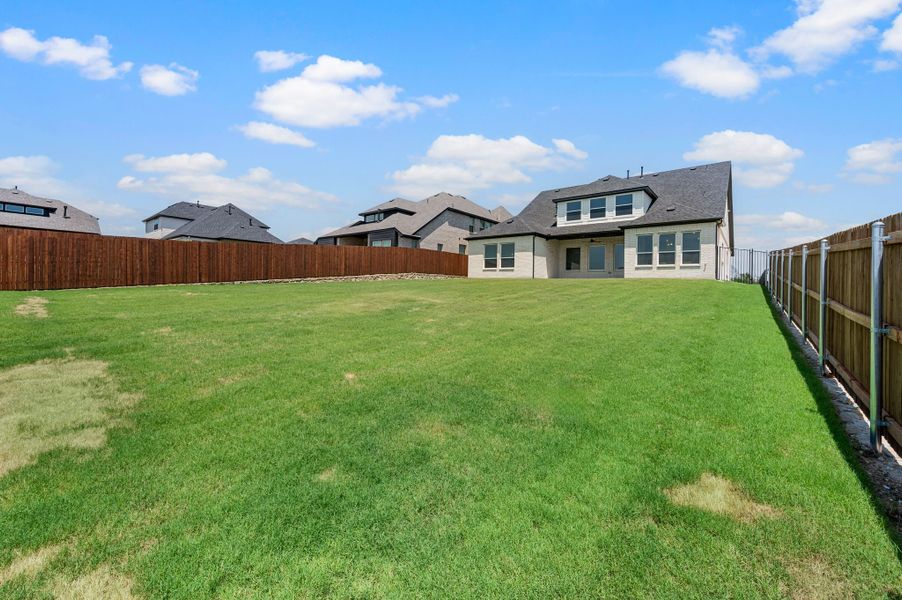 Exterior details and patio area of a home in Parks of Aledo, Aledo (Image 28).