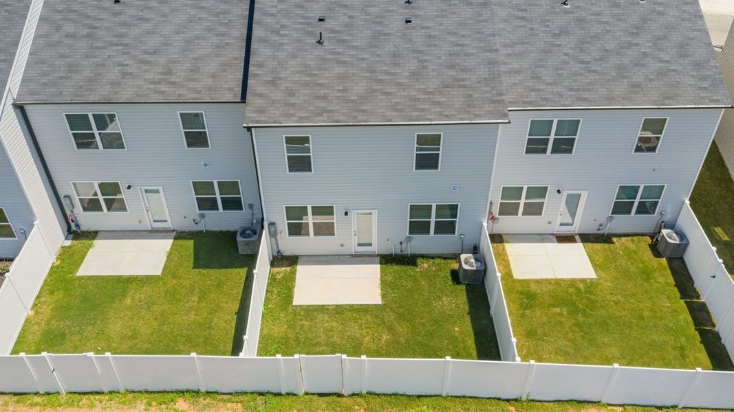 Exterior details and patio area of a home in Rushing Waters Townhomes, North Augusta (Image 4). Exterior details and patio area of a home in Rushing Waters Townhomes, North Augusta (Image 4).