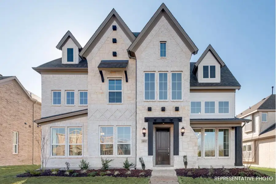 Representative exterior photo of a completed home built from the Royal Summit by Grand Homes in Prairie Ridge, Venus, TX (Image 2). Representative exterior photo of a completed home built from the Royal Summit by Grand Homes in Prairie Ridge, Venus, TX (Image 2).