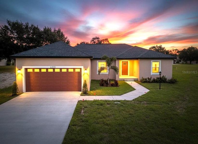 Front exterior of a new home in , Dade City, FL, highlighting curb appeal (Image 27). Front exterior of a new home in , Dade City, FL, highlighting curb appeal (Image 27).
