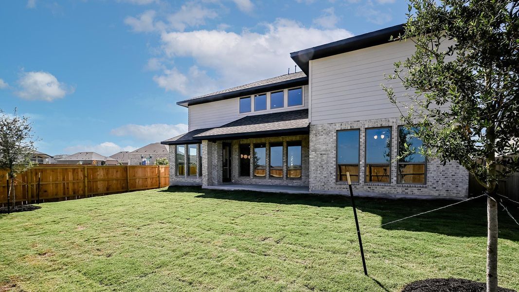 Exterior details and patio area of a home in Crosswinds, Kyle (Image 3).