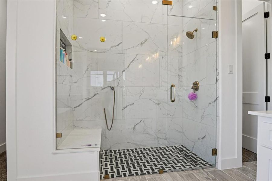 Full bathroom with a marble finish shower Full bathroom with a marble finish shower