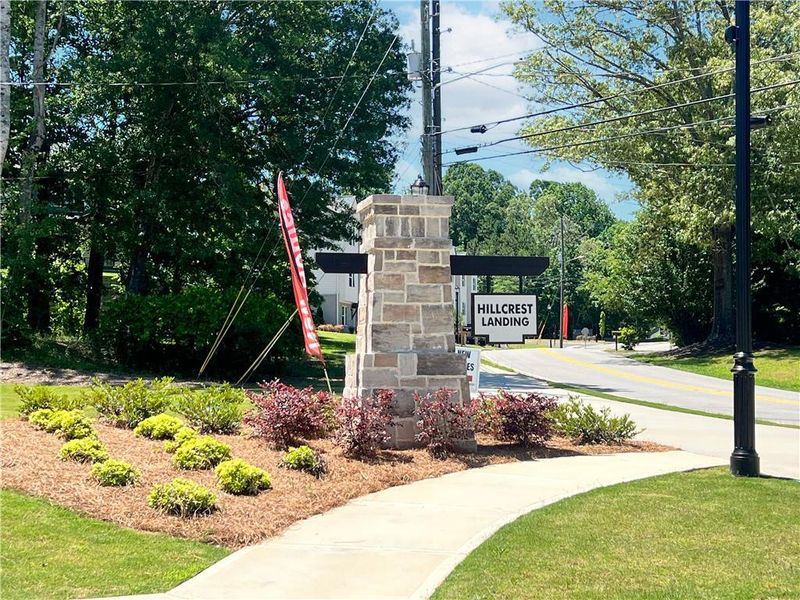 Front exterior of a new home in Hillcrest Landing, Sugar Hill, GA, highlighting curb appeal (Image 23). Front exterior of a new home in Hillcrest Landing, Sugar Hill, GA, highlighting curb appeal (Image 23).