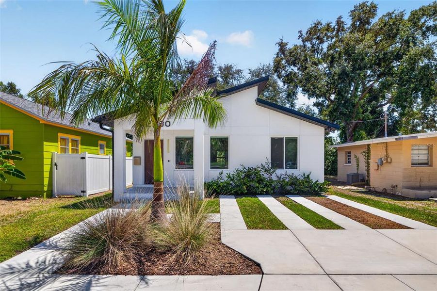 Front exterior of a new home in , St. Petersburg, FL, highlighting curb appeal (Image 18). Front exterior of a new home in , St. Petersburg, FL, highlighting curb appeal (Image 18).