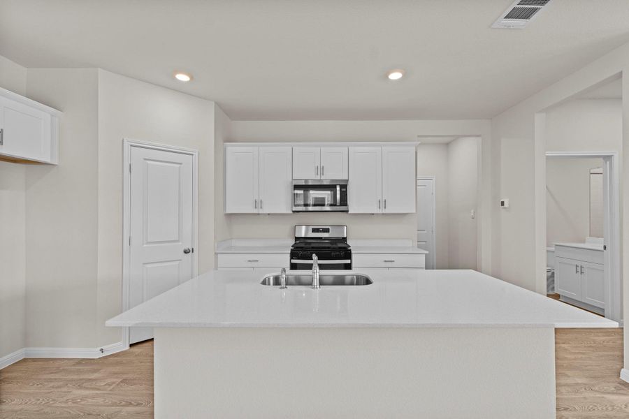 Furnished interior view inside a new home in Whisper South, San Marcos (Image 14).