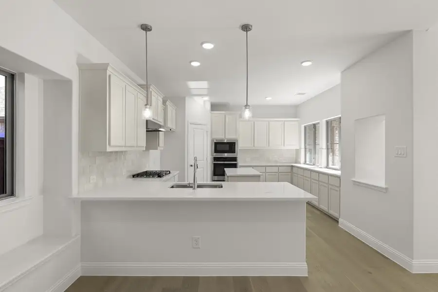 Representative furnished interior of a home built from the Trentino by Pacesetter Homes in Keeneland, Aubrey (Image 8).