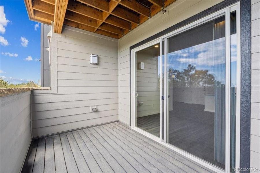 Exterior details and patio area of a home in Condo Collection at Grand Vue at Interlocken, Broomfield (Image 1). Exterior details and patio area of a home in Condo Collection at Grand Vue at Interlocken, Broomfield (Image 1).
