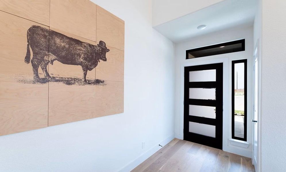 What a warm and welcoming way to step inside! This bright interior entry offers a lovely first impression, with a clean, open layout that flows naturally into the main living areas, making the home feel comfortable, inviting, and easy to enjoy from the moment you arrive. **Photos are representative only and may vary as built.**