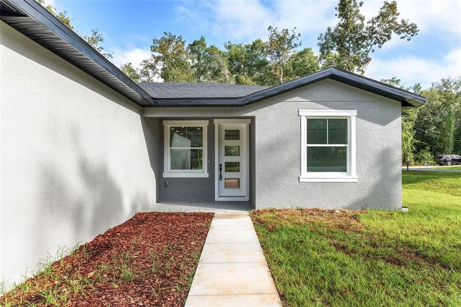 Exterior details and patio area of a home in , Ocala (Image 25).