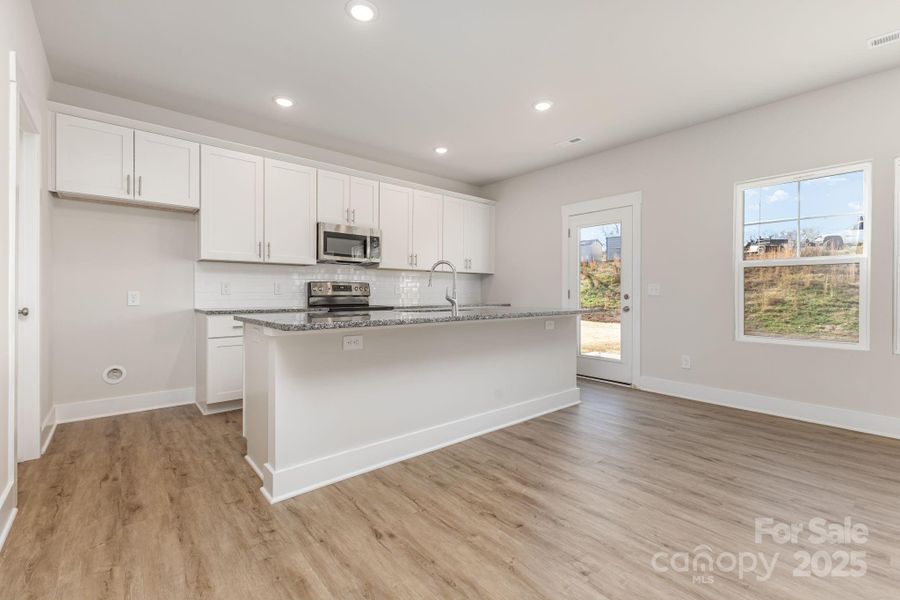 Furnished interior view inside a new home in , Mooresville (Image 6).
