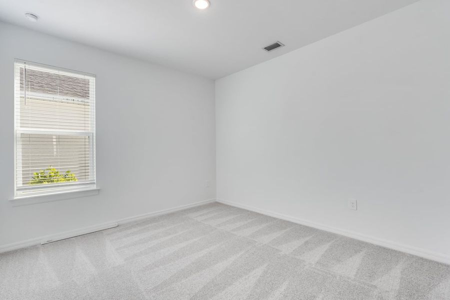 Spacious, unfurnished interior of a new home in Palms at Coasterra, Palmetto (Image 16).