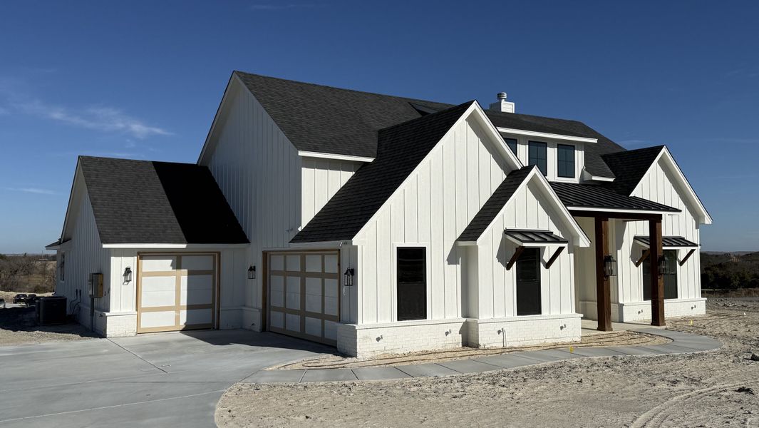 Front exterior of a new home in Aledo Heights - Aledo ISD, Annetta, TX, highlighting curb appeal (Image 2).