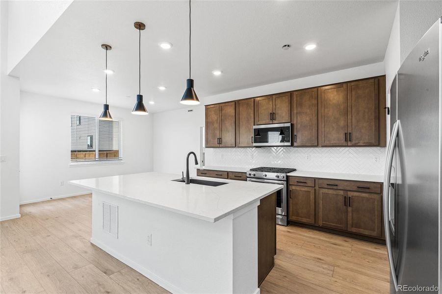 Furnished interior view inside a new home in Harvest Crossing, Aurora (Image 7).