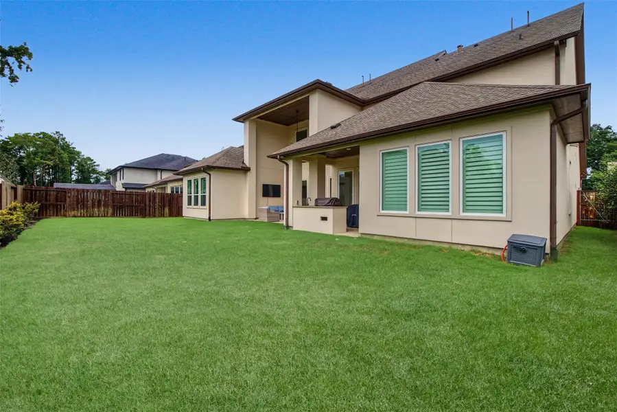 Exterior details and patio area of a home in The Highlands, Porter (Image 4).