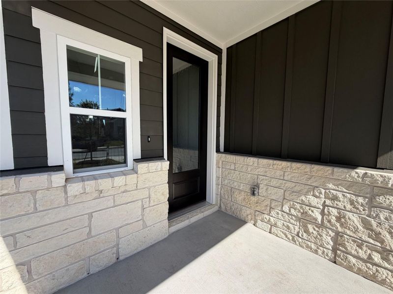 Exterior details and patio area of a home in Cannon Ranch 40s, Dripping Springs (Image 4).