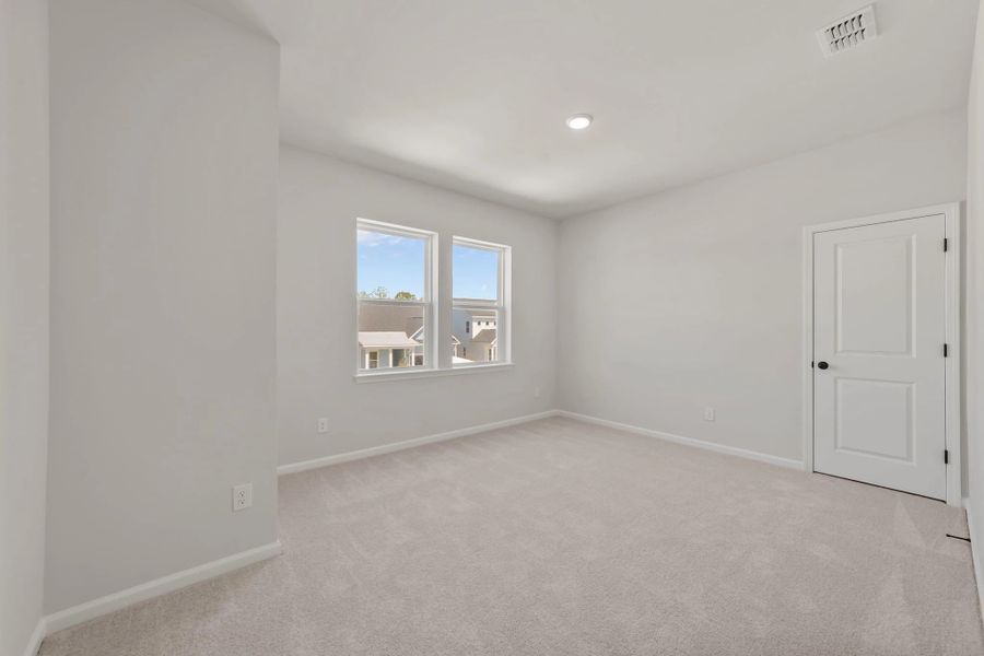 Spacious, unfurnished interior of a new home in Blue Heron Retreat, Little River (Image 20).