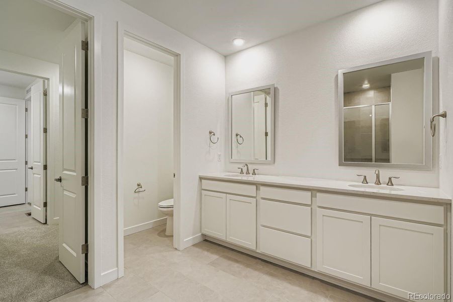 Furnished interior view inside a new home in Macanta: The Grand Collection, Castle Rock (Image 6).