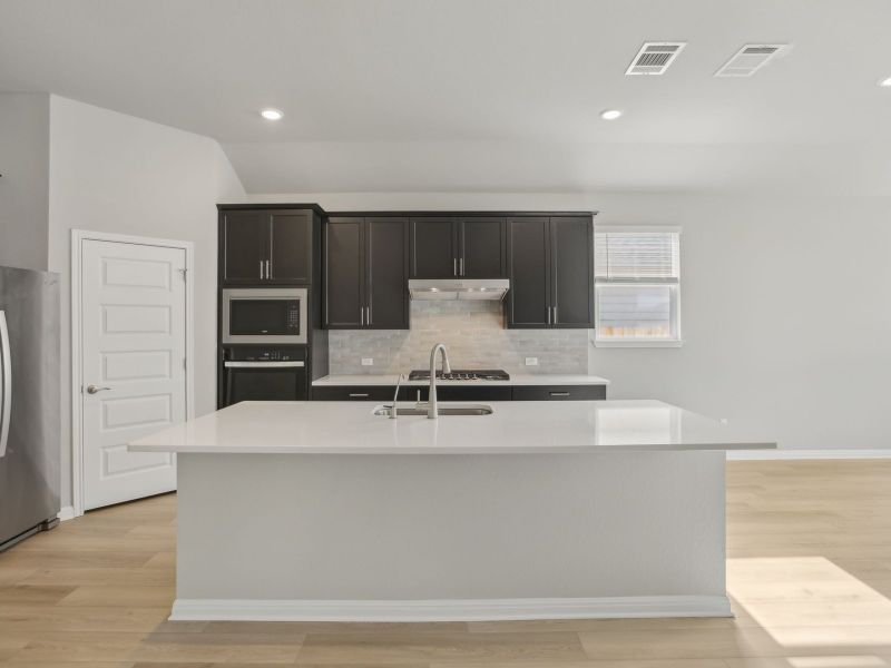 Furnished interior view inside a new home in Opal Meadows, Kyle (Image 3).