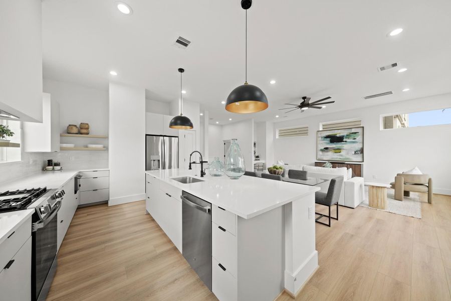 Showcasing the kitchen's abundance of counter space and storage cabinets, this kitchen truly has it all.