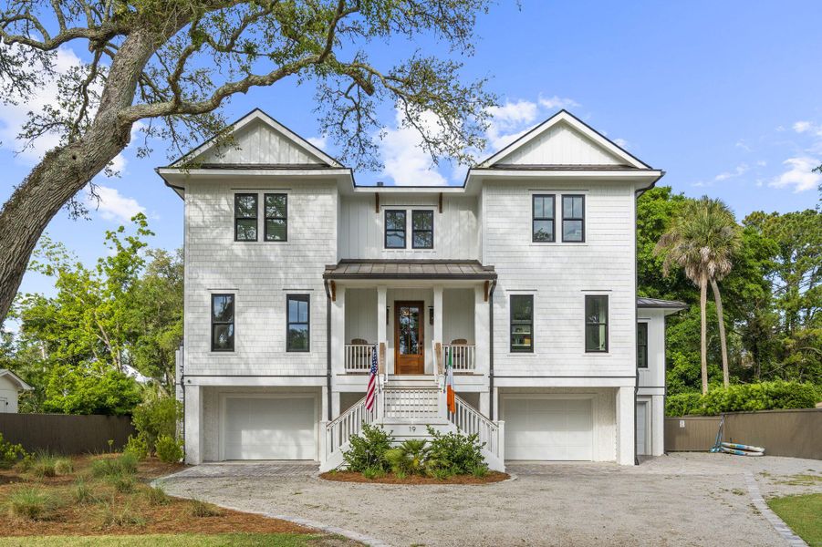 Front exterior of a new home in , Isle Of Palms, SC, highlighting curb appeal (Image 23). Front exterior of a new home in , Isle Of Palms, SC, highlighting curb appeal (Image 23).
